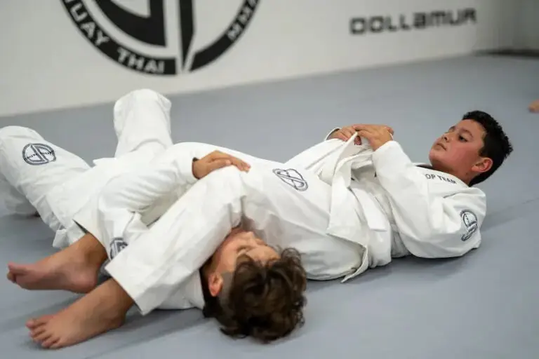 students practicing submissions for teens martial arts classes