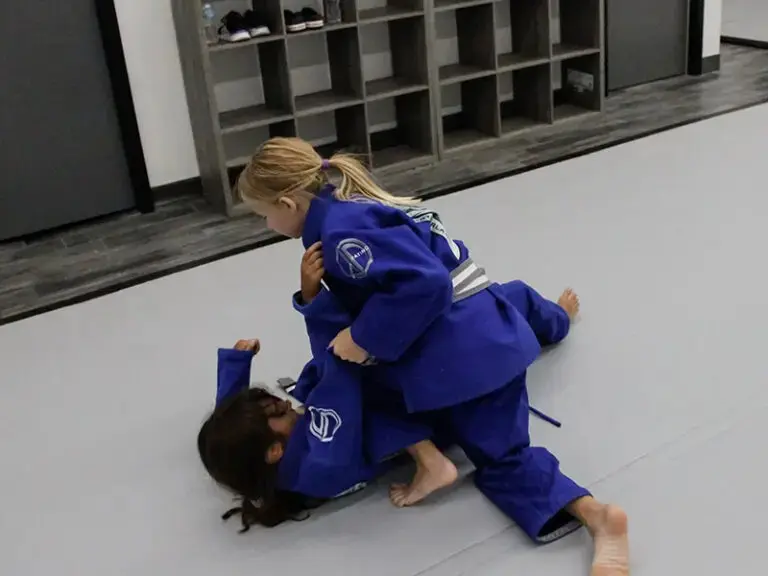 kids practicing moves for kids martial arts lesssons